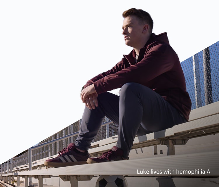 Image of man seated on bleachers