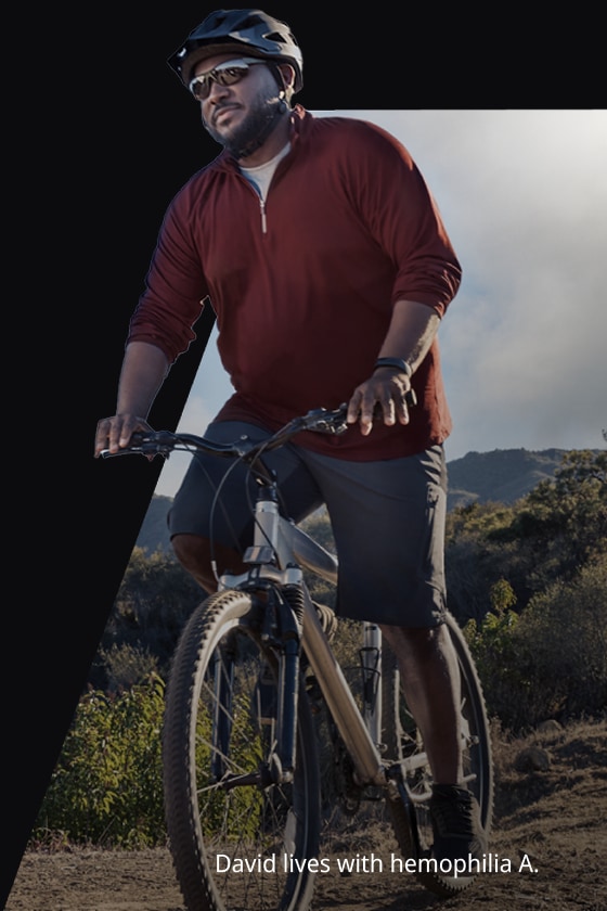 David, an adult man living with hemophilia A, rides his bicycle.
