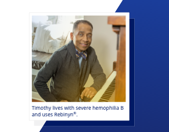 A man named Timothy sits at the piano and smiles.